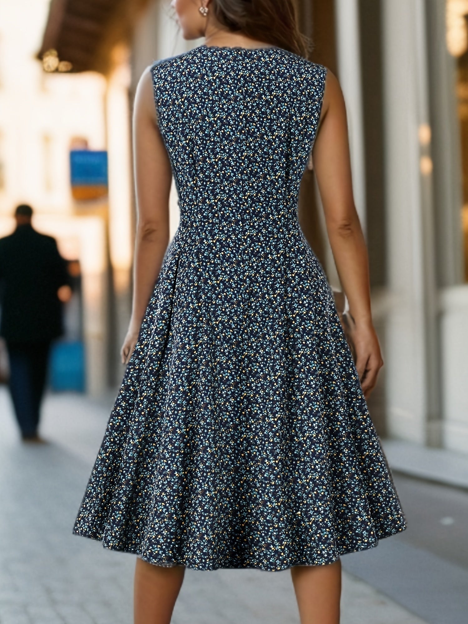 Zomerse jurk Lily voor dames – mouwloze midi-jurk met bloemenprint en elegante snit