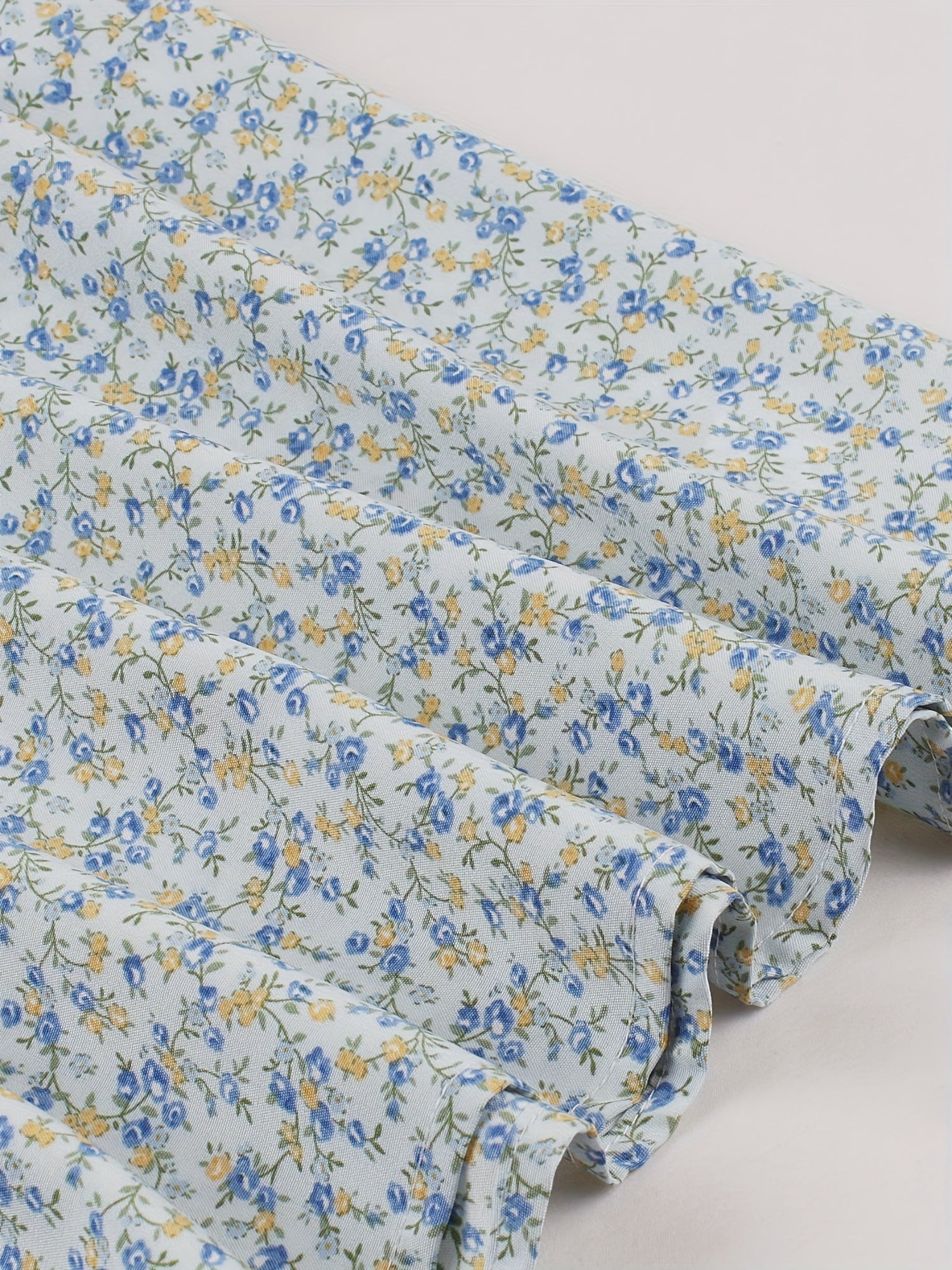 Zomerse jurk Lily voor dames – mouwloze midi-jurk met bloemenprint en elegante snit