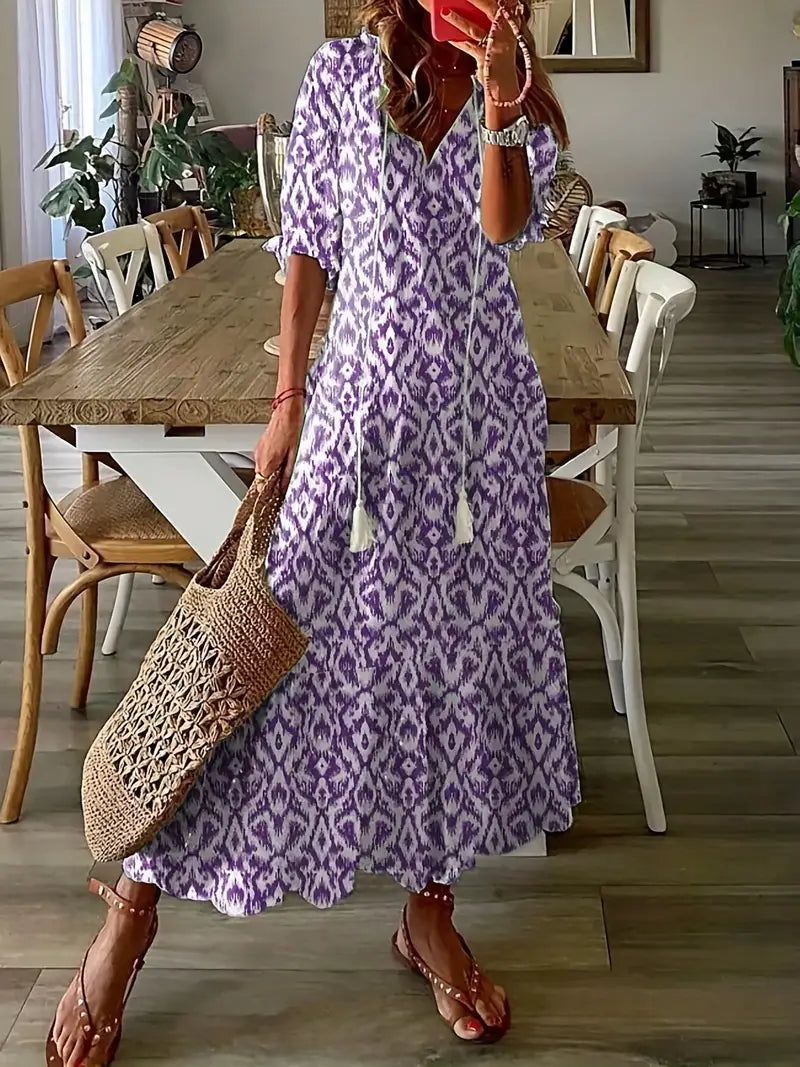 Urocza sukienka w stylu boho dla kobiet – elegancka letnia sukienka z falbankami, dekoltem w serek i wzorem ikat