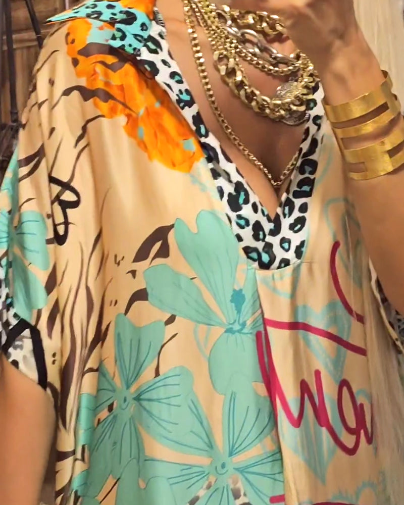 Sukienka damska Diana – Elegancka długa sukienka z głębokim dekoltem, nadrukiem w panterkę i przewiewnym krojem