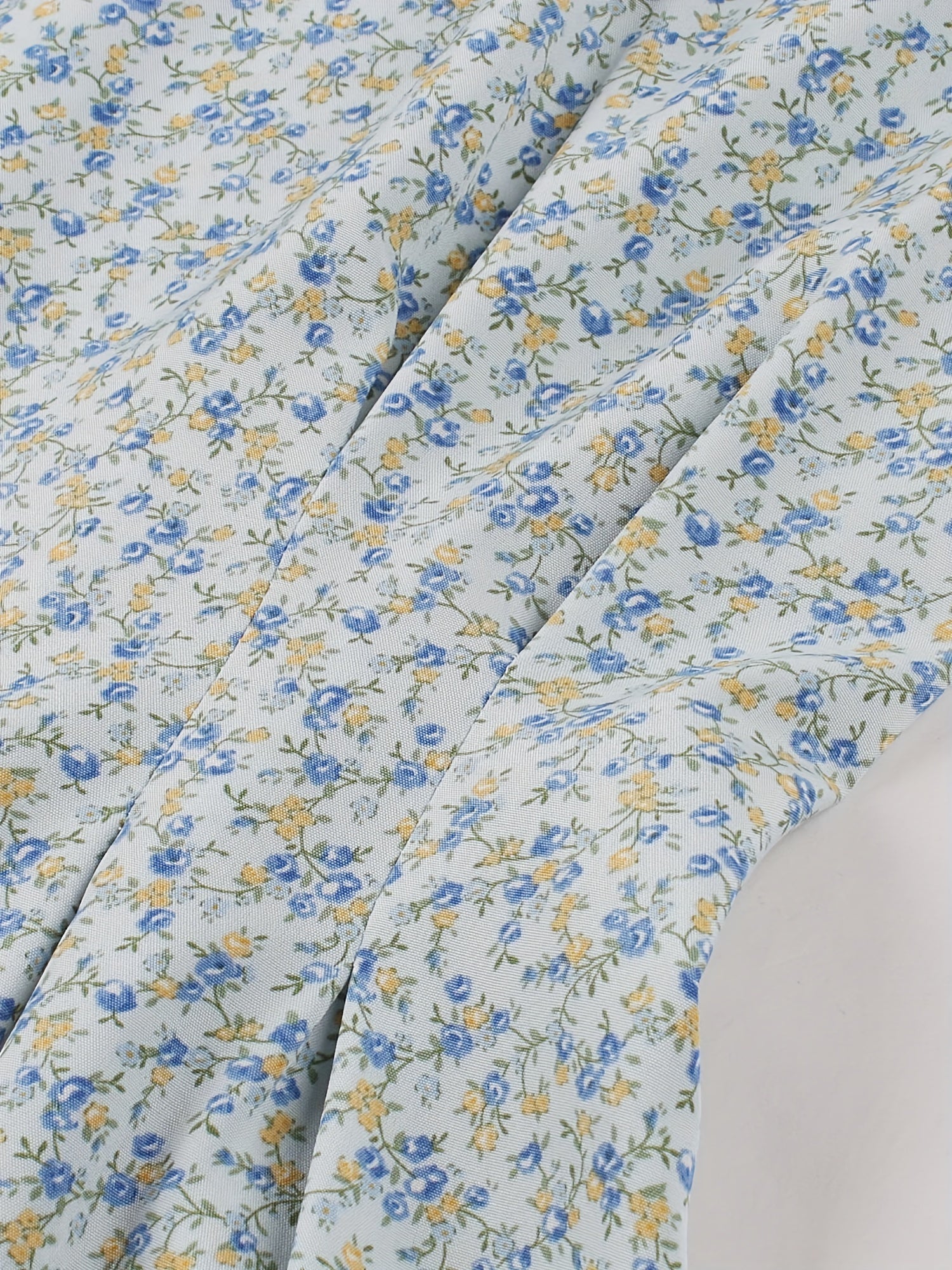 Zomerse jurk Lily voor dames – mouwloze midi-jurk met bloemenprint en elegante snit