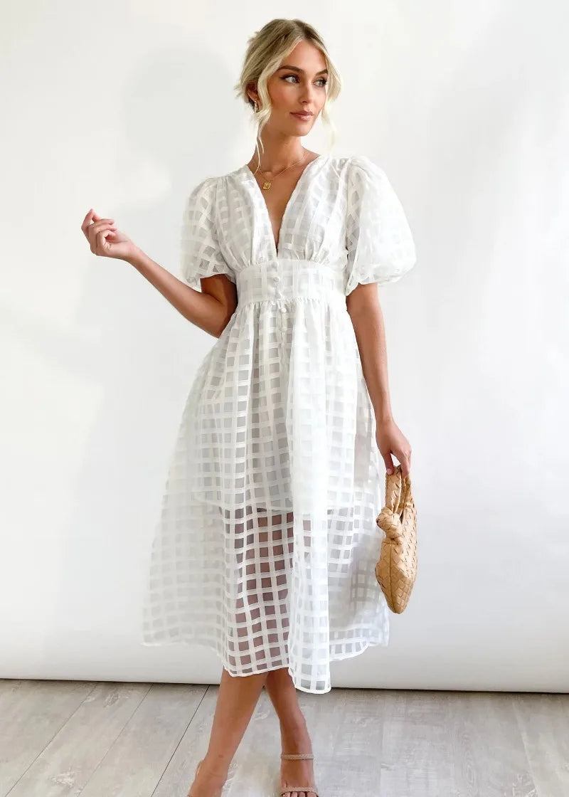 Mylene Robe Midi Femme – Chic ternet kjole med volumen & levende farve