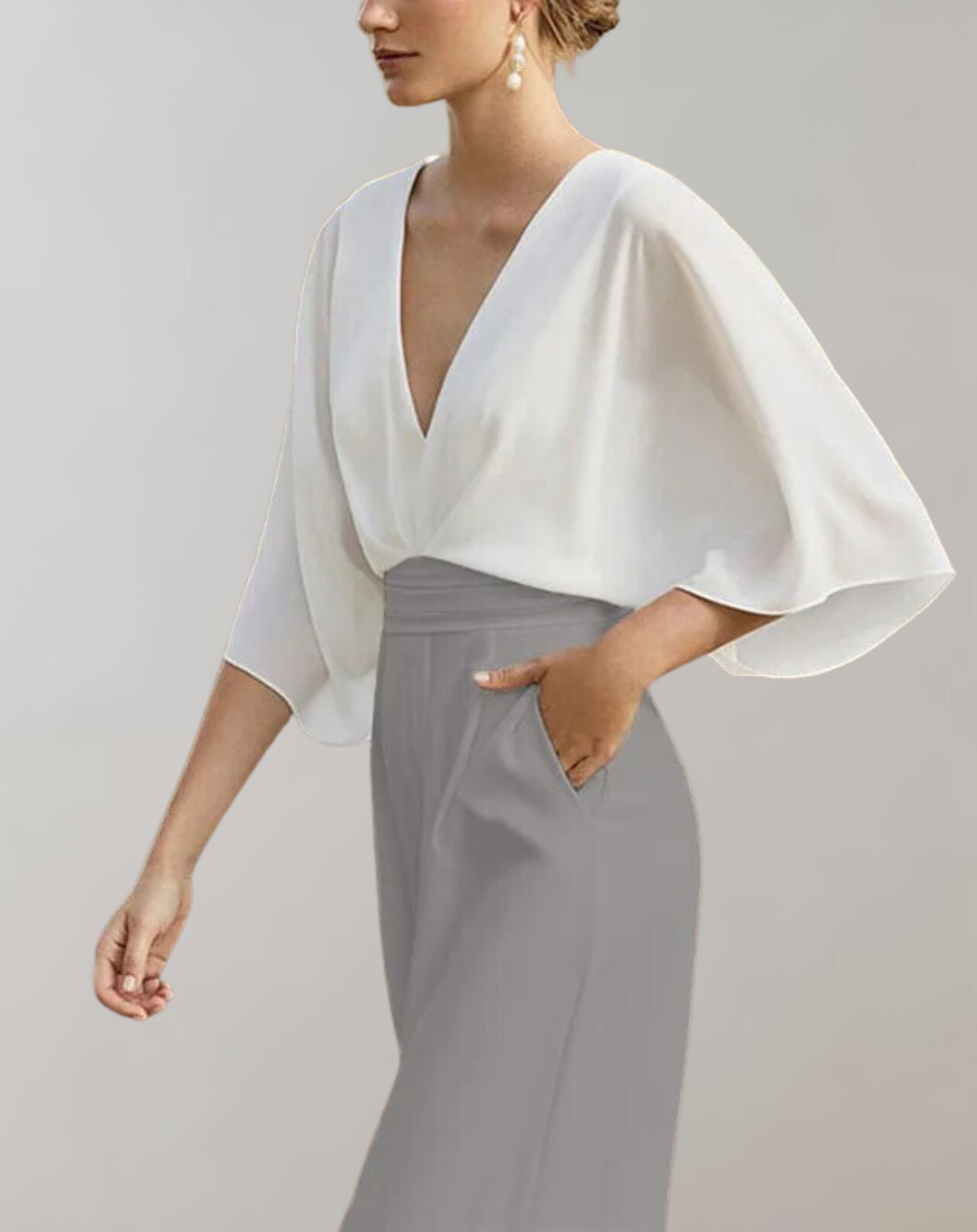 Suzette Combinaison Femme – Elegant dragt med dyb udskæring og vide ben til et raffineret look