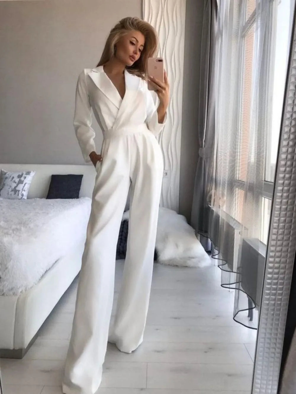 Melia Kvinneheldrakt – Elegant, pustende jumpsuit med elastisk midje og moderne snitt