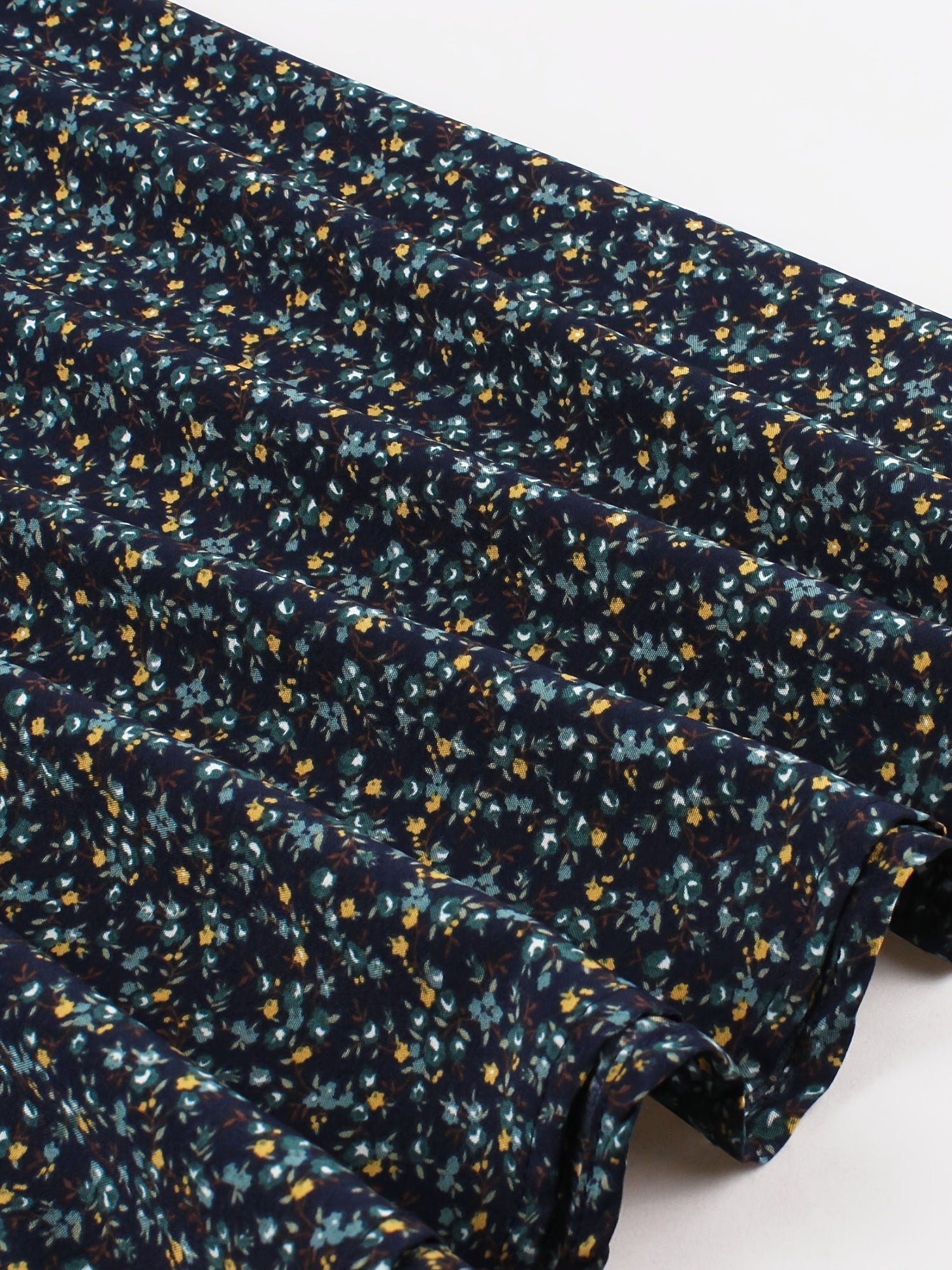 Zomerse jurk Lily voor dames – mouwloze midi-jurk met bloemenprint en elegante snit
